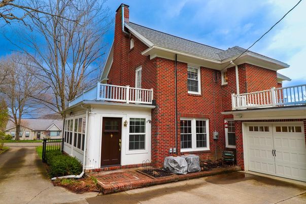 Attached, Exterior, Facade, Brick Facade, American Foursquare