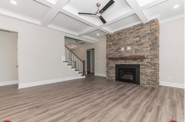 Empty room, Fireplace, Interior, Recessed Lighting, Stone Walls, Wood Texture Flooring