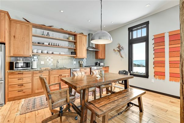 Dining room, Interior, Kitchen, Pendant Lights, Recessed Lighting, Stainless Steel Appliances, Wood Texture Flooring