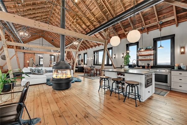 Dining room, Fireplace, Interior, Kitchen, Living room, Pendant Lights, Stainless Steel Appliances, Wooden Beams, Wooden Ceilings, Wood Texture Flooring