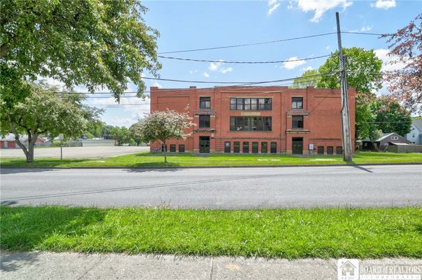 Exterior, Facade, Brick Facade, Condo Building