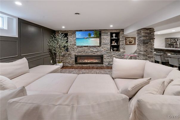 Dining room, Fireplace, Interior, Living room, Recessed Lighting, Stone Walls