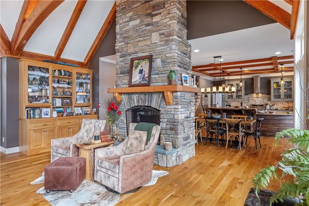 Chandelier, Dining room, Fireplace, Interior, Kitchen, Pendant Lights, Recessed Lighting, Stone Walls, Wooden Beams, Wood Texture Flooring