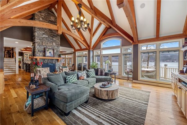 Chandelier, Fireplace, Interior, Living room, Stone Walls, Wooden Beams, Wood Texture Flooring