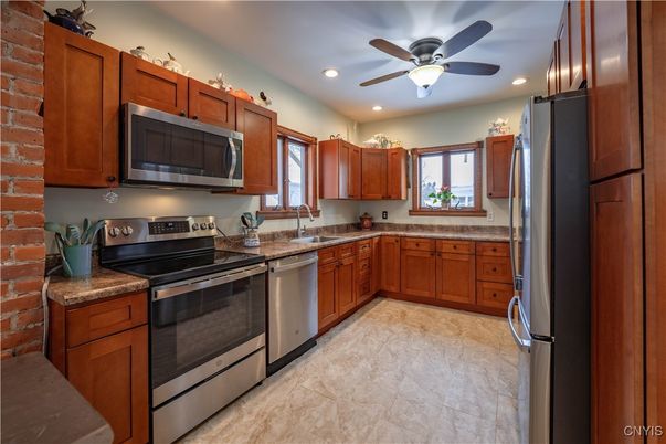 Interior, Kitchen, Recessed Lighting, Stainless Steel Appliances, Stone Walls