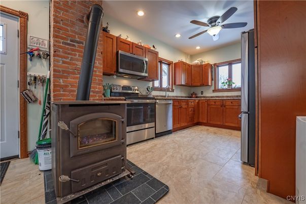 Interior, Kitchen, Recessed Lighting, Stainless Steel Appliances, Stone Walls