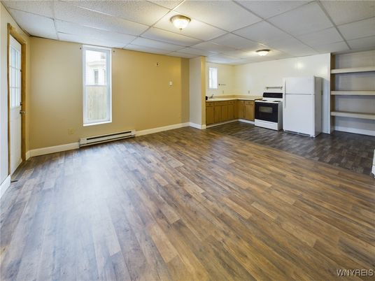 Empty room, Interior, Kitchen, Stainless Steel Appliances, Wood Texture Flooring