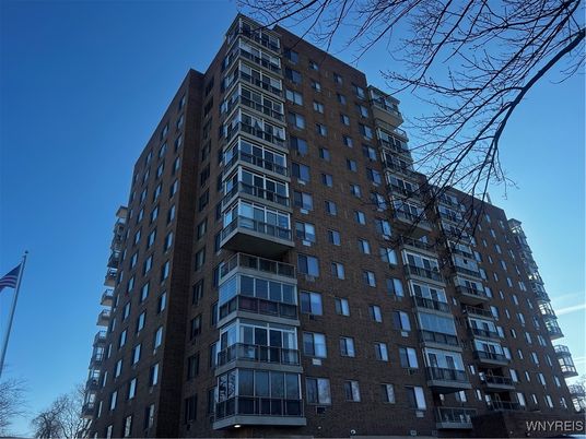 Exterior, Facade, Brick Facade, Condo Building