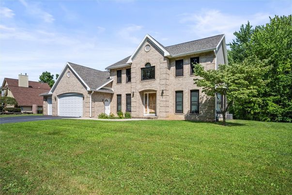 Attached, Backyard, Exterior, Facade, Brick Facade, French Provincial