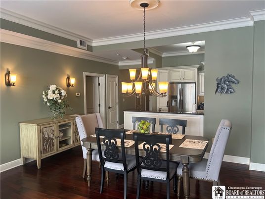 Chandelier, Dining room, Interior, Kitchen, Pendant Lights, Stainless Steel Appliances, Wood Texture Flooring