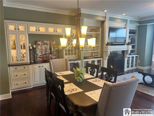 Dining room, Fireplace, Interior, Pendant Lights, Recessed Lighting, Wood Texture Flooring