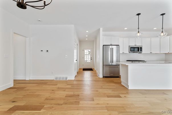 Interior, Kitchen, Pendant Lights, Recessed Lighting, Stainless Steel Appliances, Wood Texture Flooring