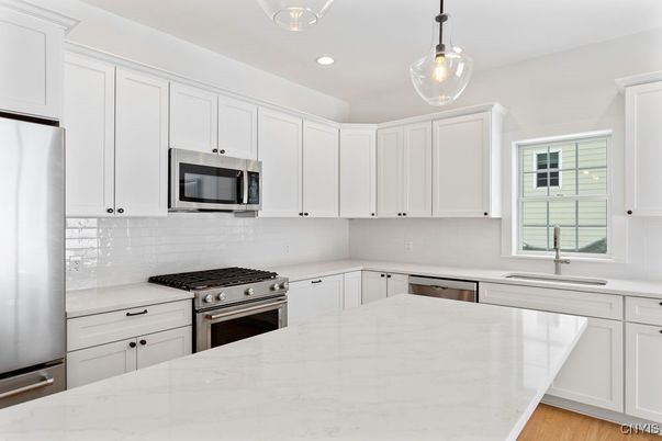 Interior, Kitchen, Pendant Lights, Recessed Lighting, Stainless Steel Appliances, Wood Texture Flooring