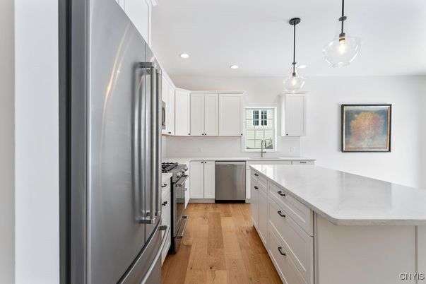 Interior, Kitchen, Pendant Lights, Recessed Lighting, Stainless Steel Appliances, Wood Texture Flooring