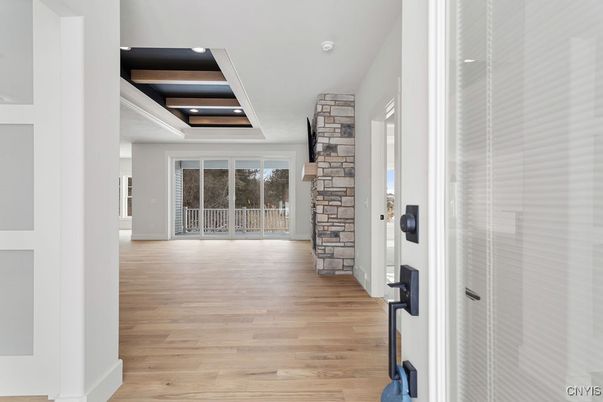 Fireplace, Interior, Recessed Lighting, Stone Walls, Wood Texture Flooring