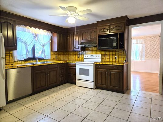 Interior, Kitchen, Tile Countertops, Wood Texture Flooring