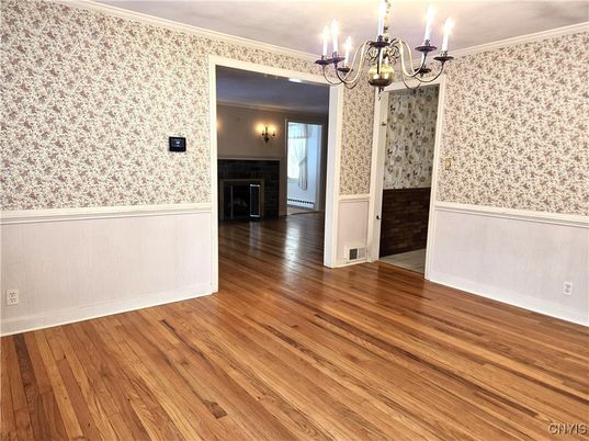 Chandelier, Empty room, Fireplace, Interior, Wood Texture Flooring
