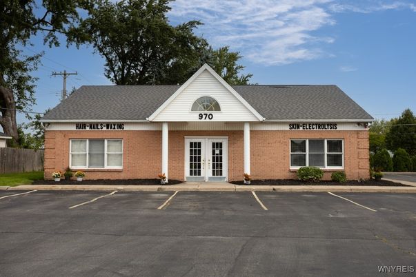 Exterior, Facade, Brick Facade, Cape Cod