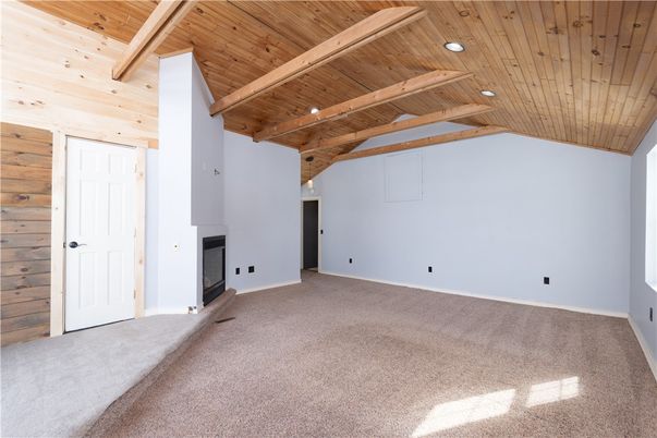 Empty room, Fireplace, Interior, Pendant Lights, Wooden Beams, Wooden Ceilings, Wooden Walls