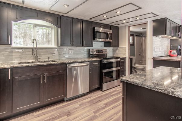 Interior, Kitchen, Recessed Lighting, Stainless Steel Appliances, Wood Texture Flooring