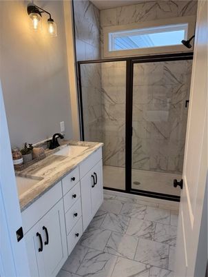 Bathroom, Dual Sink Vanities, Glass Shower, Interior, Marble, Marble Walls