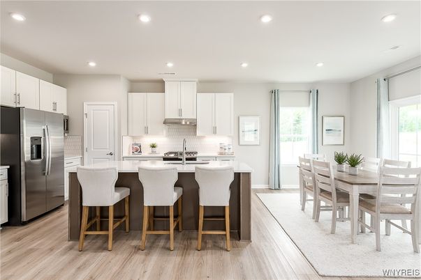 Dining room, Interior, Kitchen, Recessed Lighting, Stainless Steel Appliances, Wood Texture Flooring