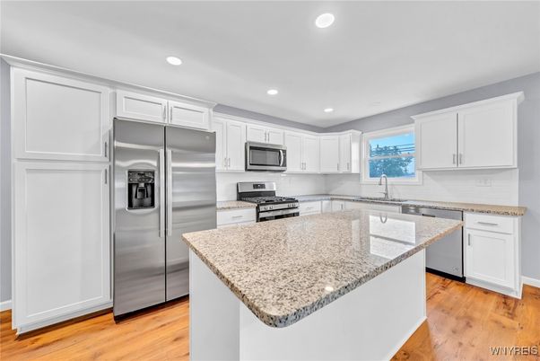 Interior, Kitchen, Recessed Lighting, Stainless Steel Appliances, Wood Texture Flooring