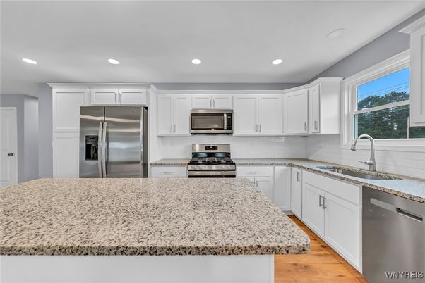 Interior, Kitchen, Recessed Lighting, Stainless Steel Appliances, Wood Texture Flooring