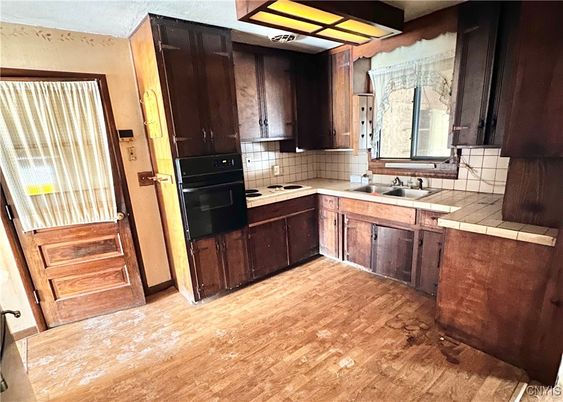 Interior, Kitchen, Tile Countertops, Wood Texture Flooring