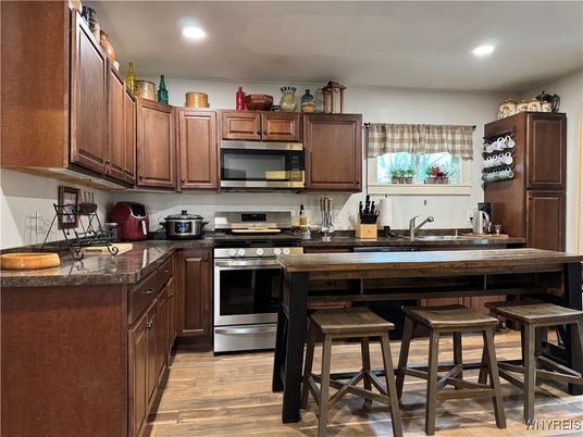 Interior, Kitchen, Recessed Lighting, Stainless Steel Appliances, Wood Texture Flooring