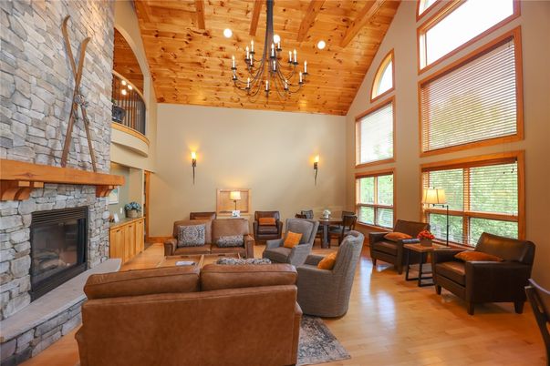 Chandelier, Fireplace, Interior, Living room, Stone Walls, Wooden Beams, Wooden Ceilings, Wood Texture Flooring