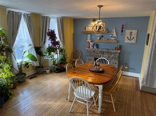 Dining room, Fireplace, Interior, Pendant Lights, Wood Texture Flooring