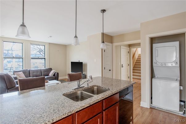 Interior, Living room, Pendant Lights, Utility Closets, Washer, Wood Texture Flooring