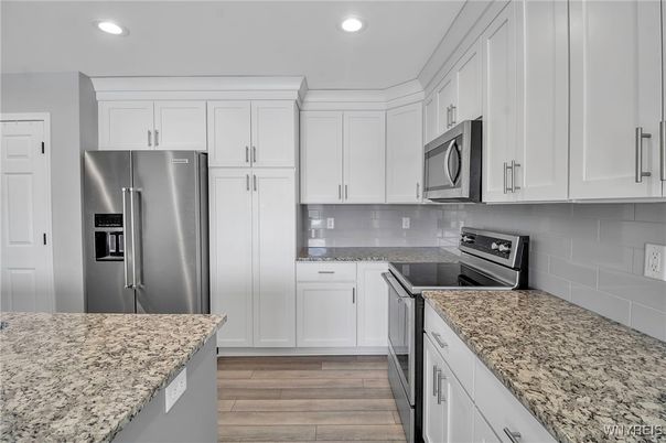 Interior, Kitchen, Recessed Lighting, Stainless Steel Appliances, Wood Texture Flooring