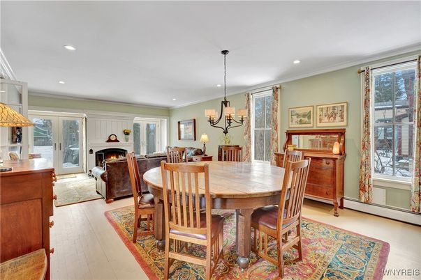 Chandelier, Dining room, Fireplace, Interior, Living room, Recessed Lighting, Wood Texture Flooring