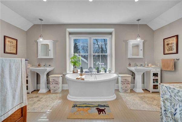 Bathroom, Dual Sink Vanities, Free Standing Baths, Interior, Pendant Lights, Recessed Lighting, Wood Texture Flooring