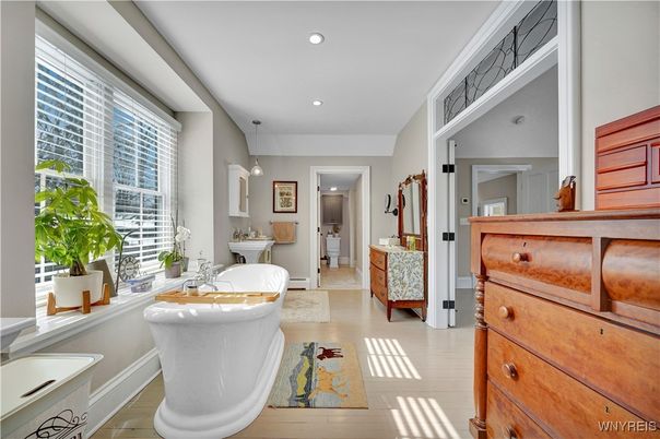 Bathroom, Free Standing Baths, Interior, Pendant Lights, Recessed Lighting, Wood Texture Flooring