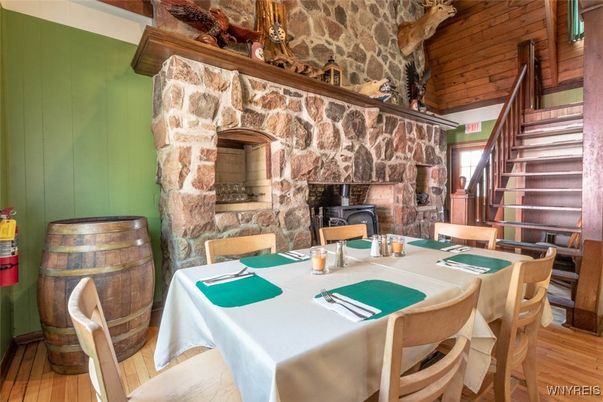 Dining room, Fireplace, Interior, Stone Walls, Wooden Ceilings, Wood Texture Flooring