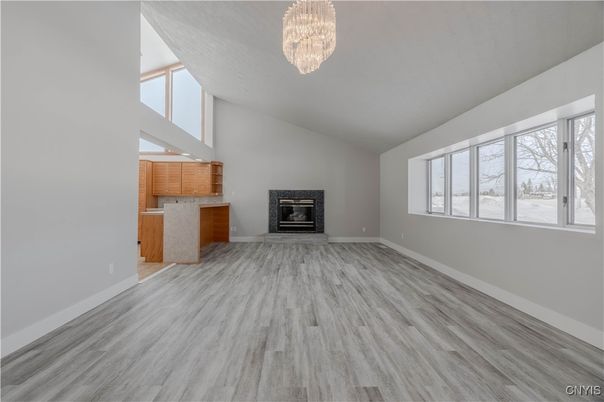 Chandelier, Empty room, Fireplace, Interior, Wood Texture Flooring