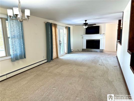 Chandelier, Empty room, Fireplace, Interior