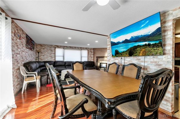 Dining room, Interior, Living room, Recessed Lighting, Stone Walls, Wood Texture Flooring