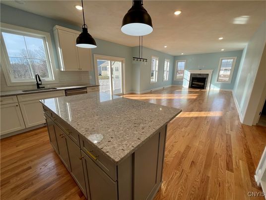 Fireplace, Interior, Kitchen, Pendant Lights, Recessed Lighting, Wood Texture Flooring