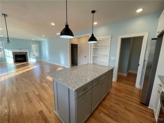 Fireplace, Interior, Kitchen, Pendant Lights, Recessed Lighting, Wood Texture Flooring