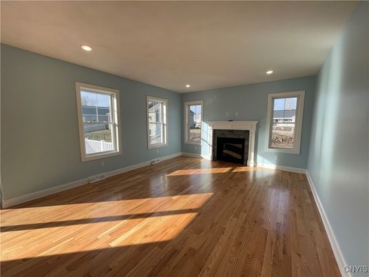 Empty room, Fireplace, Interior, Recessed Lighting, Wood Texture Flooring