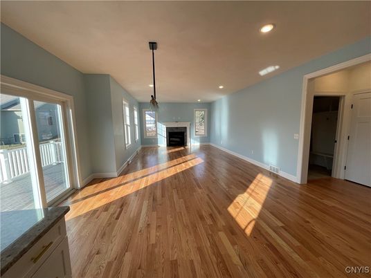 Empty room, Fireplace, Interior, Recessed Lighting, Wood Texture Flooring