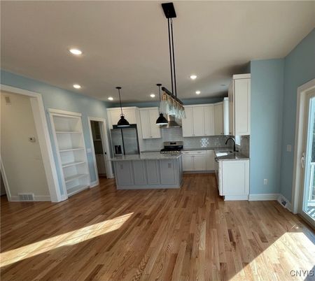Interior, Kitchen, Pendant Lights, Recessed Lighting, Stainless Steel Appliances, Wood Texture Flooring