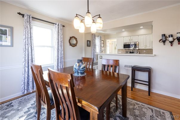 Chandelier, Dining room, Interior, Kitchen, Recessed Lighting, Stainless Steel Appliances, Wood Texture Flooring