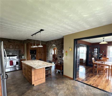 Dining room, Interior, Kitchen, Pendant Lights, Stainless Steel Appliances, Wood Texture Flooring