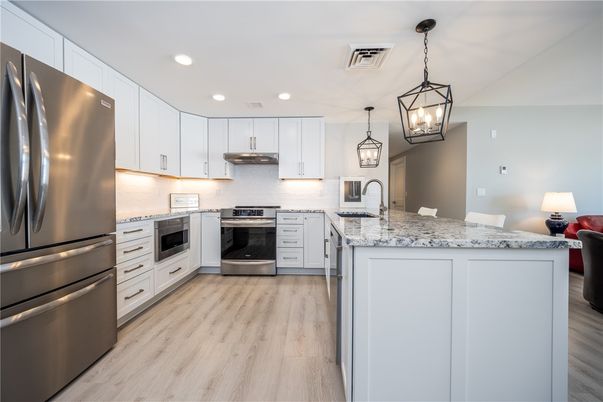 Interior, Kitchen, Pendant Lights, Recessed Lighting, Stainless Steel Appliances, Wood Texture Flooring