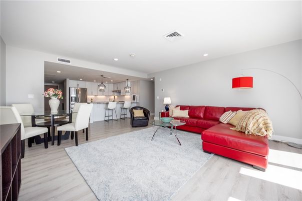 Dining room, Interior, Kitchen, Living room, Pendant Lights, Recessed Lighting, Stainless Steel Appliances, Wood Texture Flooring